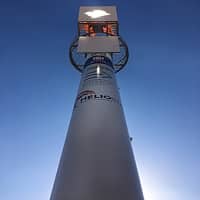 Heliostats focus sunlight onto receiver towers to produce concentrated solar power.