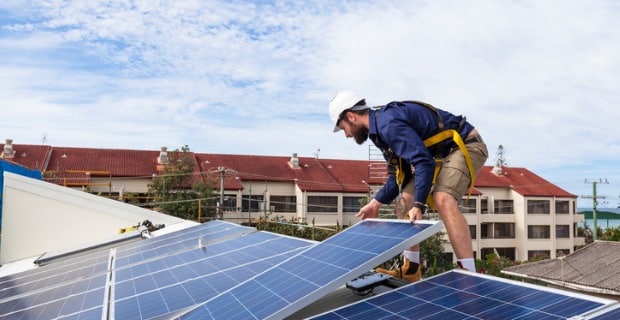 Installing solar is one way of creating energy efficient community housing.